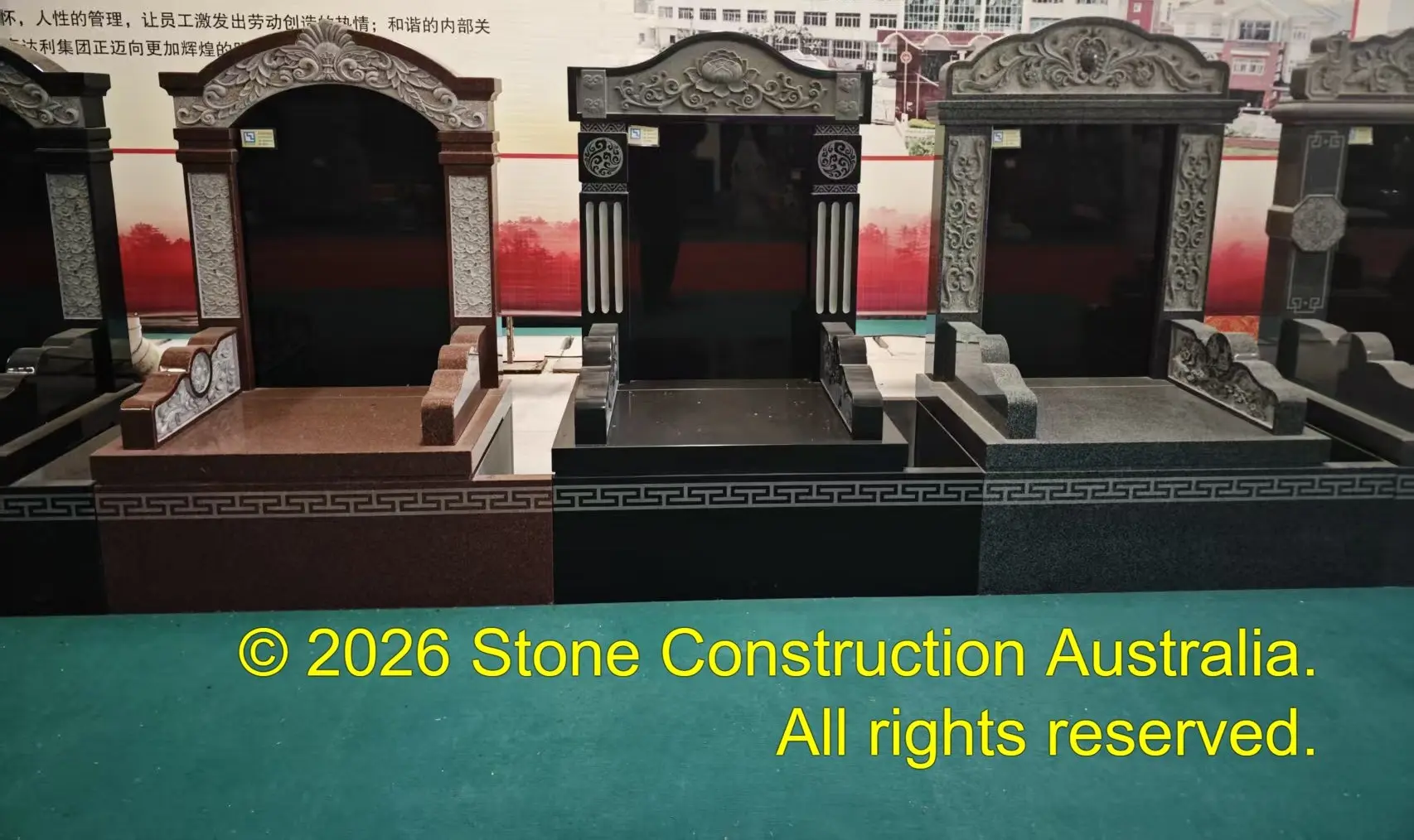 Stone memorial monument with a polished surface and engraved inscription, set outdoors on a landscaped site Stone memorial monument with a polished surface and engraved inscription, set outdoors on a landscaped site